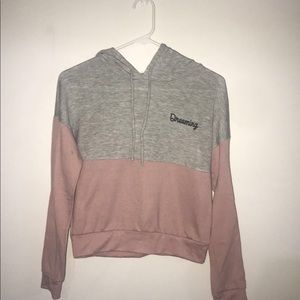 Papaya hoodie; is slightly cropped